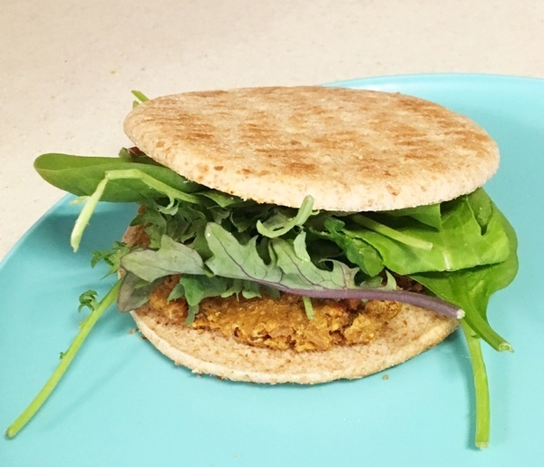 indian_burgers_3 indian lentil burger on bun with greens.