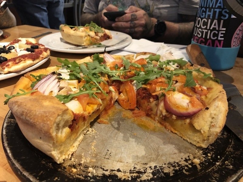vegan deep dish pizza cross section at pizza pattio in flagstaff, arizona. vegan deep dish pizza cross section at pizza pattio in flagstaff, arizona.