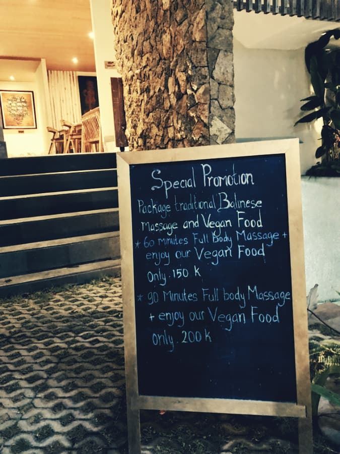 janis_vegan_corner_3 sign advertising massage and vegan meal at janis vegan corner in ubud, bali, indonesia.