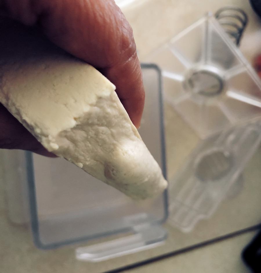 tofu_blowout side of tofu collapsed when pressed.